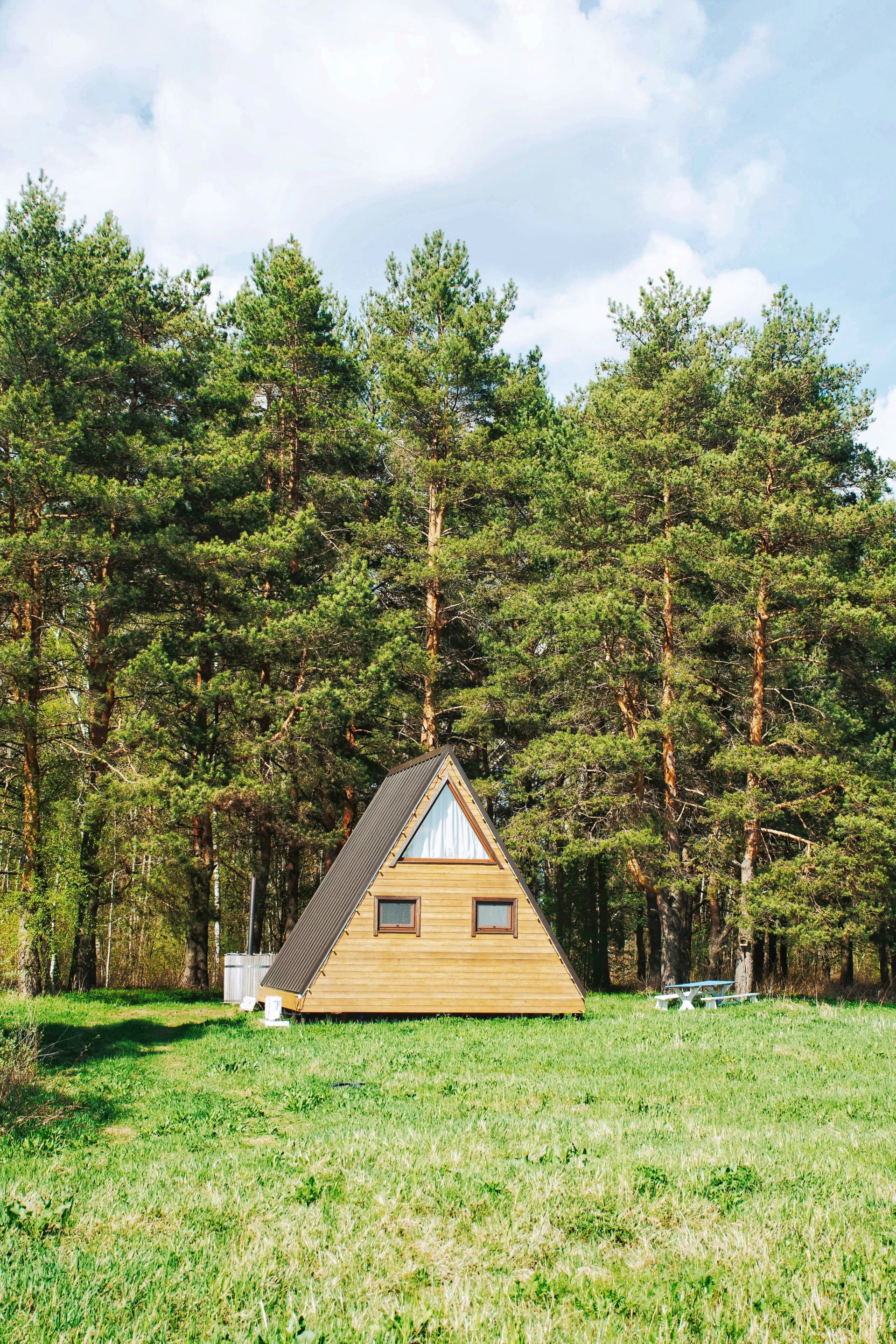 A-Frame glamping accommodation example A-Frame - A triangular-shaped glamping structure with steeply angled sides that meet at the top, forming the letter 'A', providing glamping accommodation used in outdoor hospitality feasibility studies