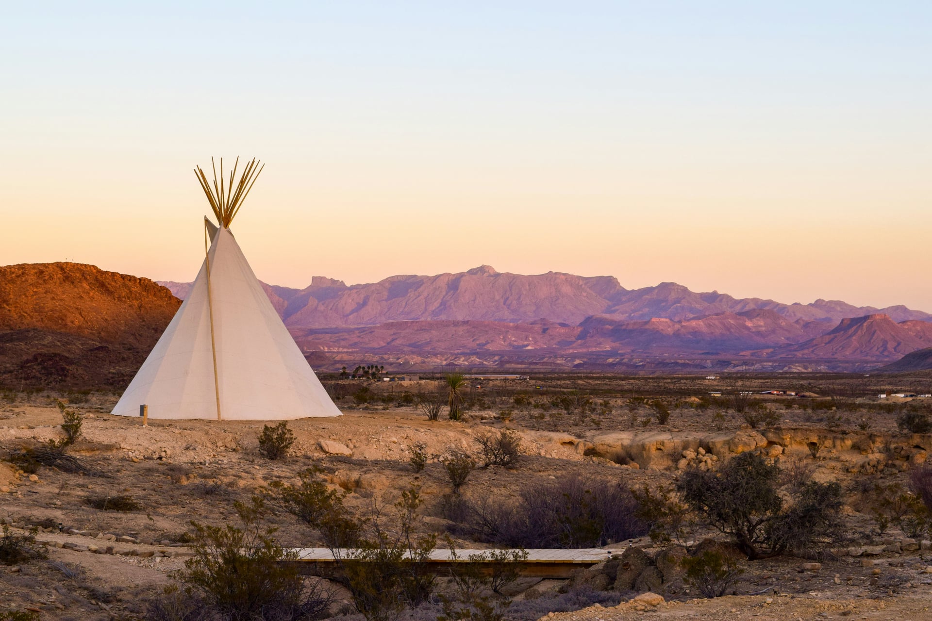 Tipi glamping accommodation example Tipi - A conical tent traditionally used by Native American tribes, constructed with a framework of wooden poles covered by can glamping accommodation used in outdoor hospitality feasibility studies
